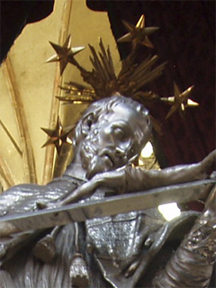 A closer view of St John Nepomuk on top of his monument