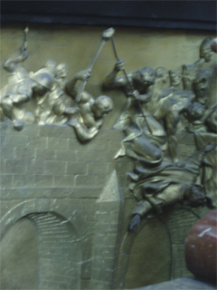 A bas-relief showing St John Nepomuk being thrown into the Vltava