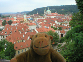 Mr Monkey looking down on Prague from the walls beneath the castle