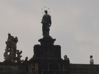 The statue of St John Nepomuk seen from the river