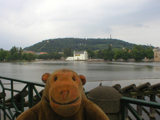 Mr Monkey looking across the Vltava to  Petřín Hill