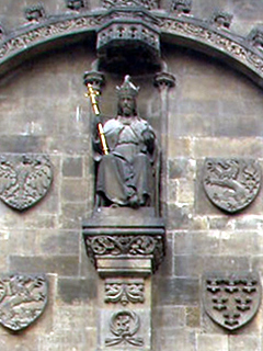 A king surrounded by shields on the Powder Tower