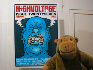 Mr Monkey in front of a very large copy of the front of High Voltage Issue 27