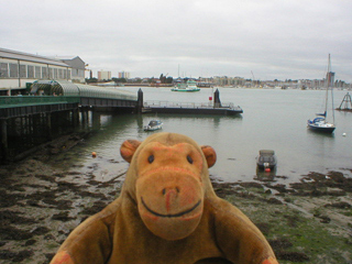 Mr Monkey looking at Portsmouth Harbour at low tide