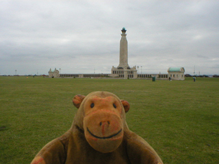Mr Monkey trotting towards the Portsmouth Naval Memorial