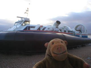 Mr Monkey watching the hovercraft turning to enter the Solent