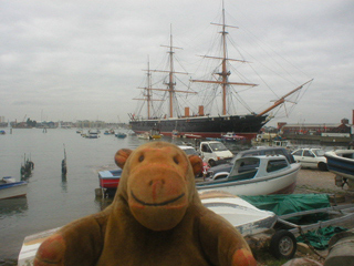 Mr Monkey looking at HMS Warrior