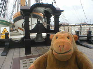 Mr Monkey looking at the ship's bell