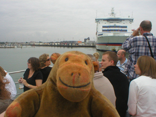 Mr Monkey looking at a ferry berthed at Portsmouth