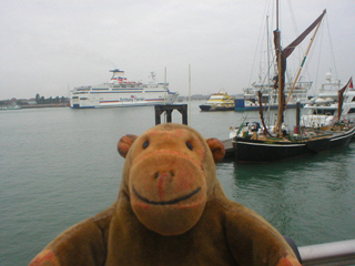 Mr Monkey watching shipping in Portsmouth harbour