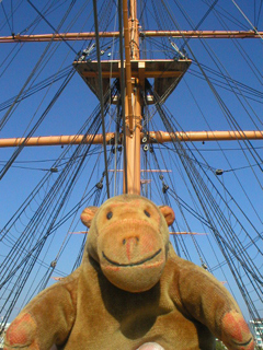 Mr Monkey looking up at a mast