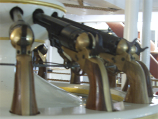 A stand of Navy pattern Colt revolvers