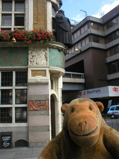 Mr Monkey outside The Black Friar pub