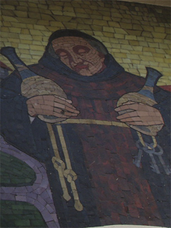 A mosaic on the facade of The Black Friar pub