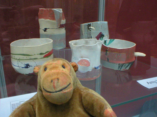 Mr Monkey looking at more ceramics by Amy Lewis