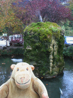 Mr Monkey looking at the fountain outside the Mining Museum