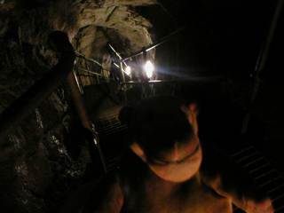 Mr Monkey climbing out of the Great Masson Caverns