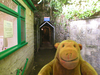 Mr Monkey going into the Rutland Caverns