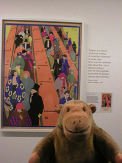 Mr Monkey looking at the artwork for Brightest London is Best reached by Underground