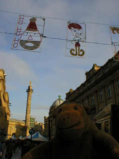 Mr Monkey looking up Grey Street