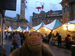 Mr Monkey looking at the Christmas market on Grey Street