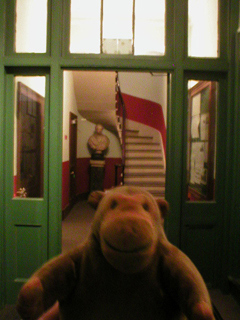 Mr Monkey going through the Works front door