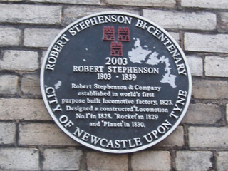 The plaque on the front of the Works