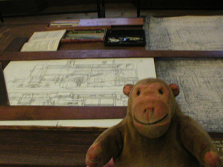Mr Monkey looking at Robert Stephenson's drawing board