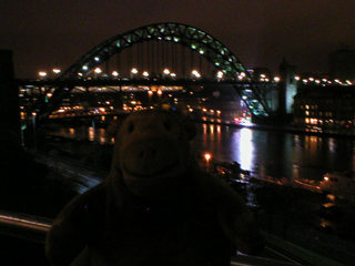 Mr Monkey looking at the Tyne Bridge from outside the Sage