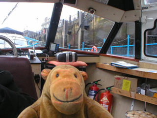 Mr Monkey looking out of the front of the boat