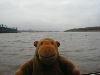 Mr Monkey looking up the Tyne as the Coventina turns