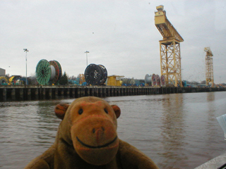 Mr Monkey looking at the Shepherd Offshore Services cranes