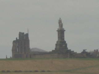 Tynemouth priory and the Collingwood monument from the river
