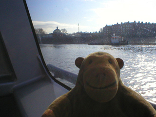 Mr Monkey watching the Clipper leave the pier at Greenwich