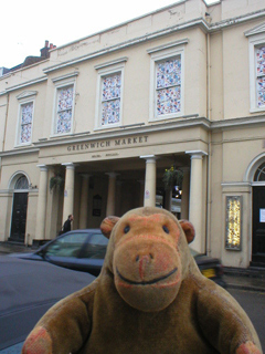 Mr Monkey looking across the road at Greenwich Market