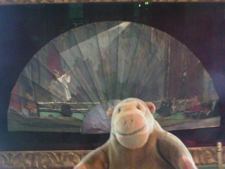 Mr Monkey looking at a fan painted by Sickert