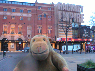 Mr Monkey looking at the Hackney Empire