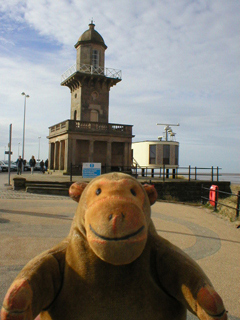 Mr Monkey looking at the Low Lighthouse