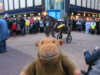 Mr Monkey watching Paka chase his mechanical horse