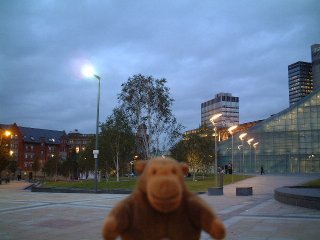 Mr Monkey in front of a different bit of Urbis