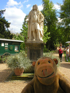 Mr Monkey looking at the statue of Sir Hans Sloane
