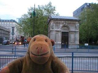 Mr Monkey looking at the lodges outside London Euston