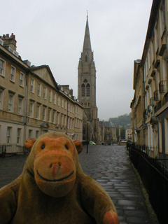 Mr Monkey looking at Duke Street and the tower of St John's