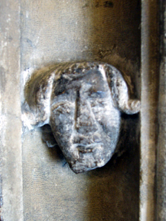 A face carved in the wall of the inner porch