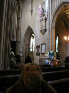 Mr Monkey looking across the nave at the Sir William Penn monument