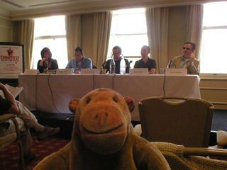 Mr Monkey watching the bad guys panel