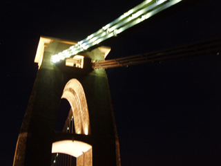 The western pier illuminated at night