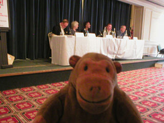 Mr Monkey watching the Conan Doyle & Poe anniversary panel