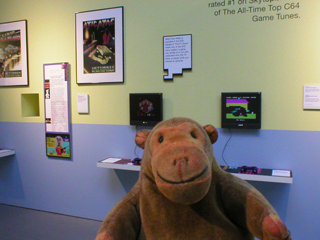Mr Monkey looking at some very early videogames