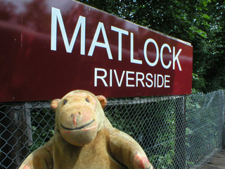 Mr Monkey with the Matlock Riverside station sign